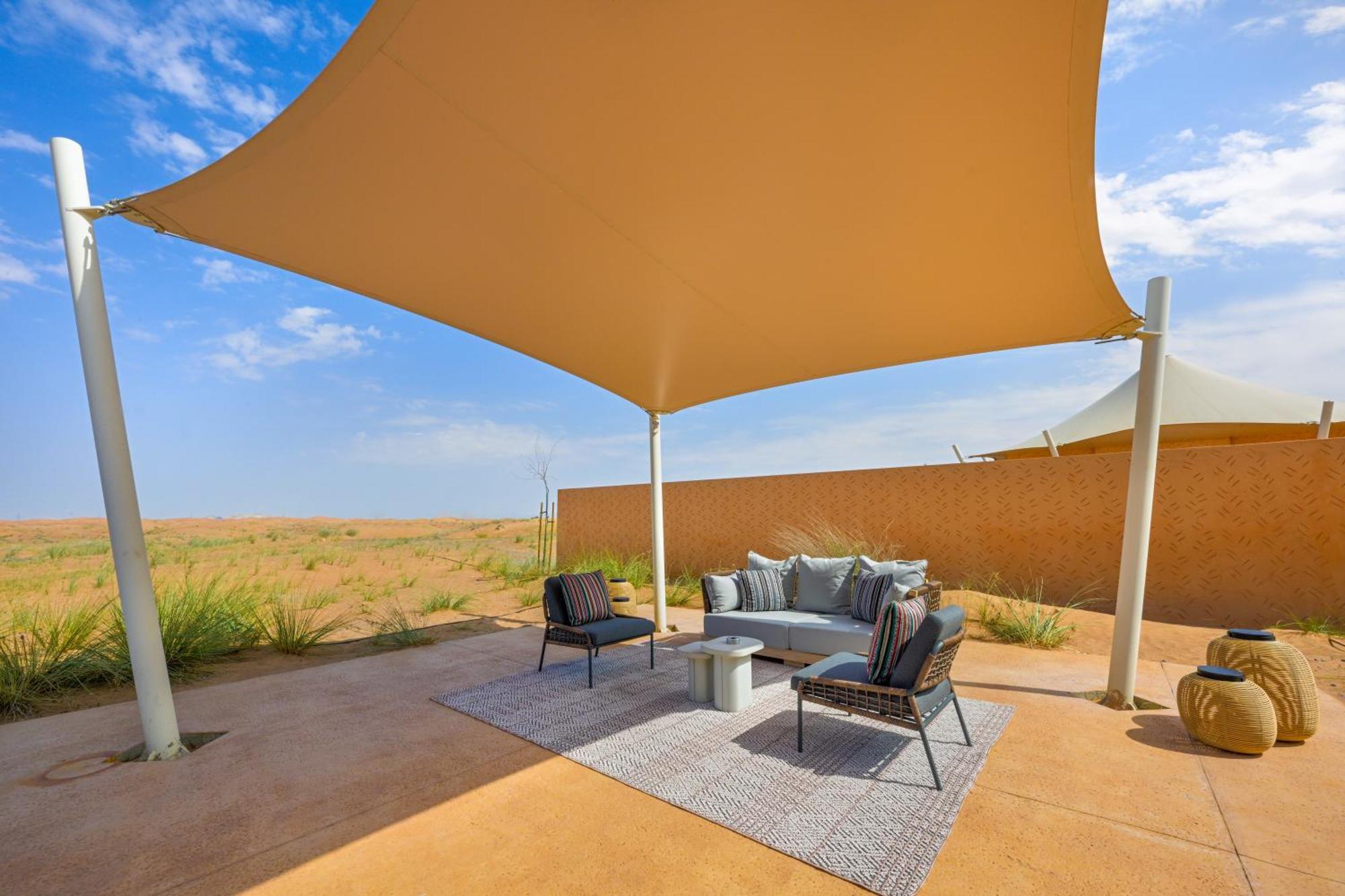 ホテル Al Badayer Retreat By Sharjah Collection Margham エクステリア 写真 A shade sail at the Al Maha Desert Resort, Dubai